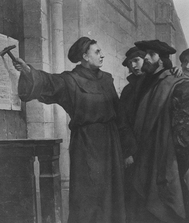  Luther hammers his 95 theses criticising the Catholic Church to the door of the church in Wittenburg, Germany