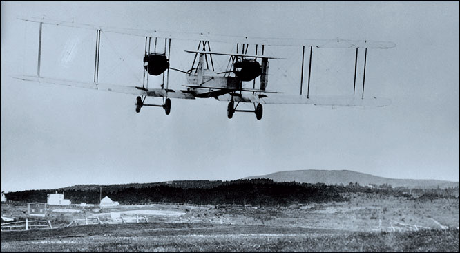  John Alcock, (1892-1919) and Arthur Whitten Brown (1886-1948) made the first transatlantic flight in 1919 in this Vickers-Vimy aeroplane, seen here leaving St. Johns, Newfoundland, on its way to Clifden, Ireland.