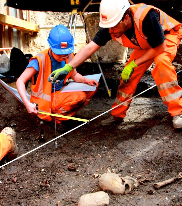  Archaeologists working on an earlier dig on the Crossrail Project