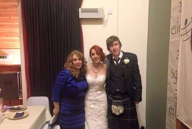 Mother of bride Celica Bleasdale - wearing the dress - with daughter Grace and son-in-law Keir Johnston at their wedding