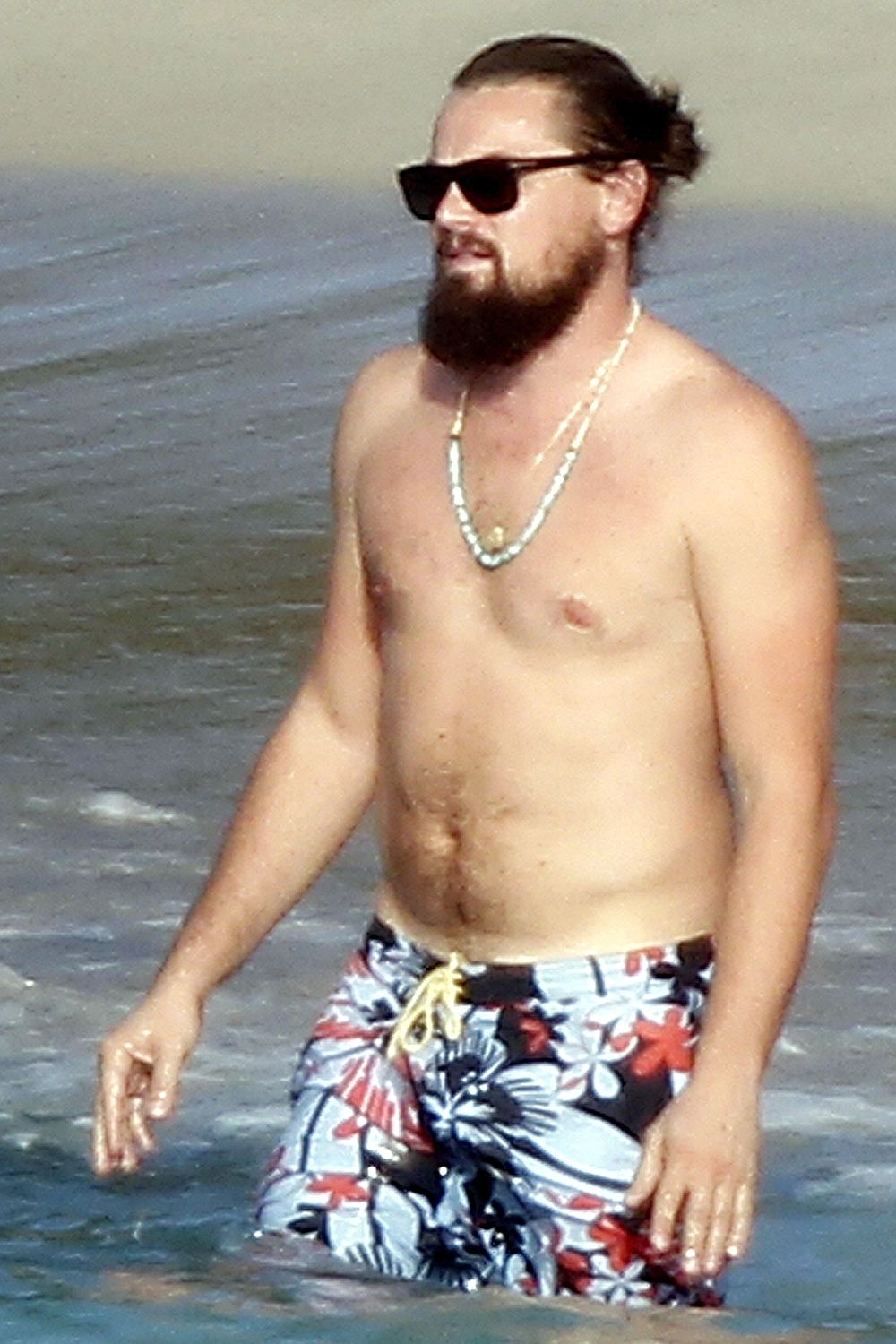 Leo's dad bod is a big hit with the models