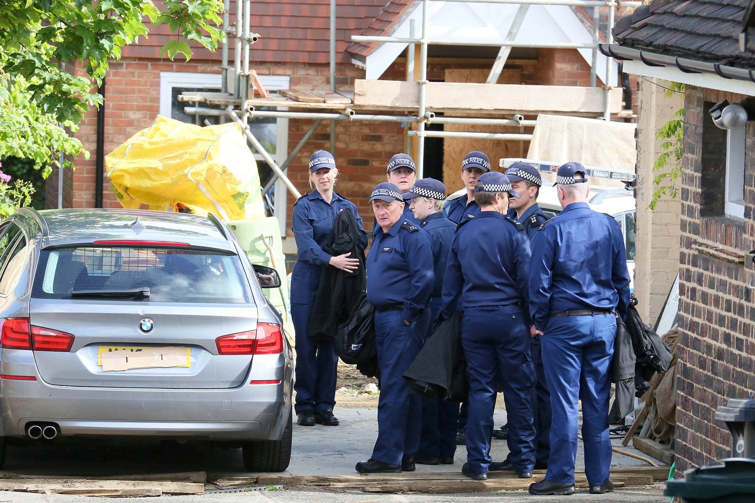 Forensic teams outside Reader's house in Dartford