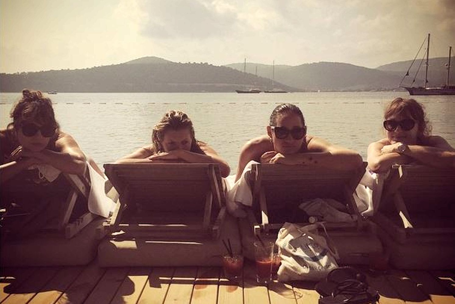 Katie turks it easy and sunbathes with pals in Instagram snap