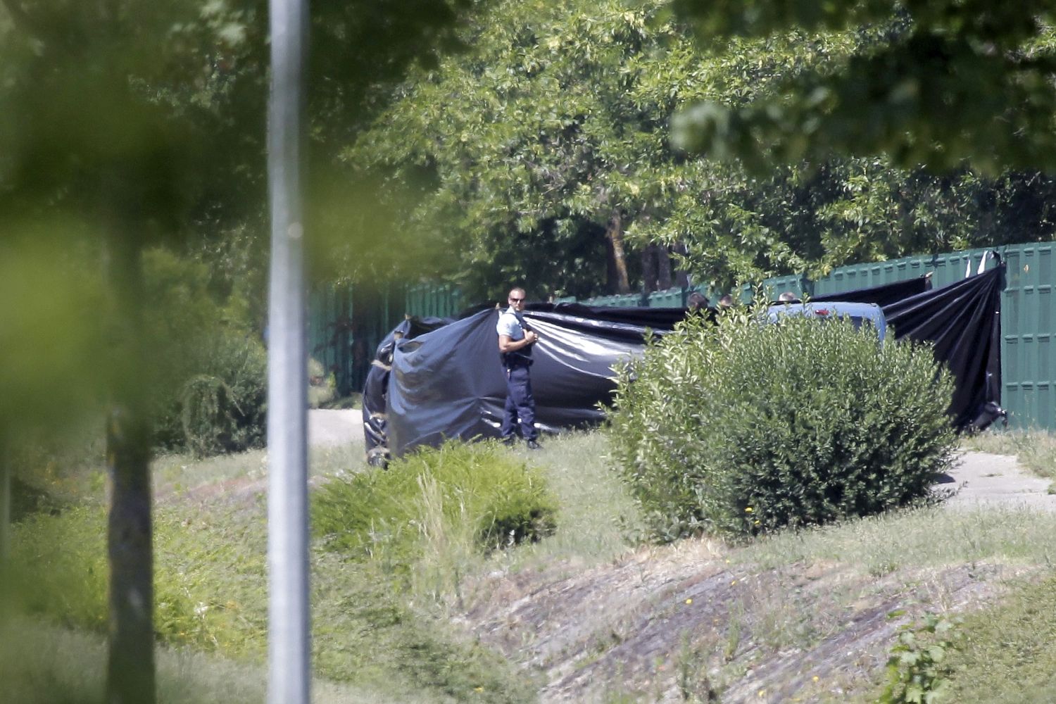 Police stand guard at factory close to French city of Lyon