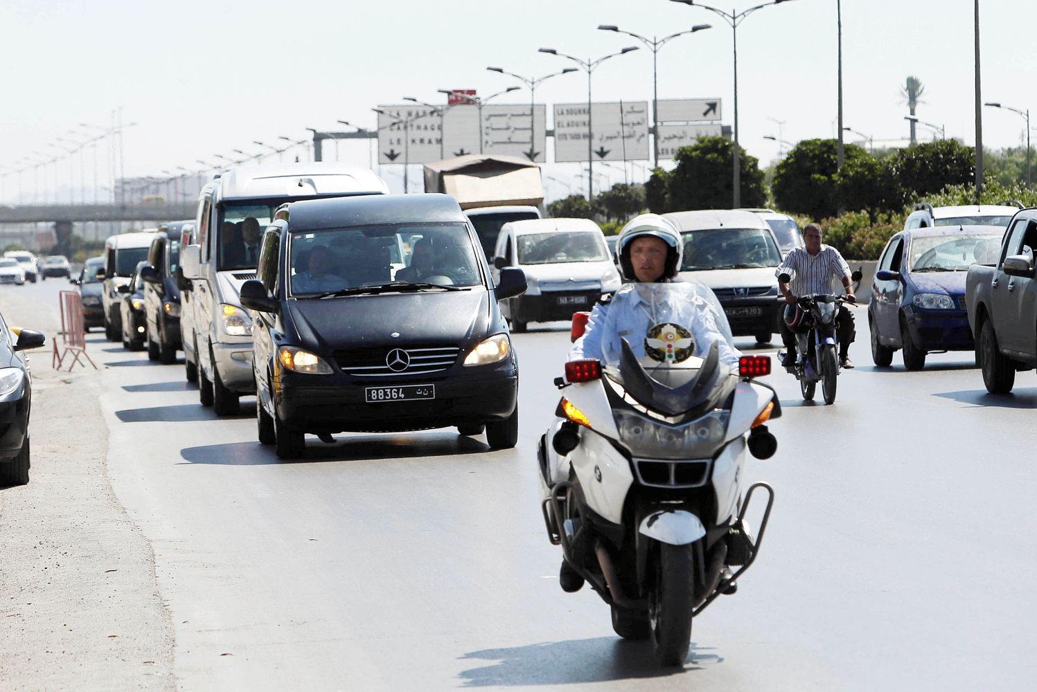 The ambulances were escorted to the airport by police