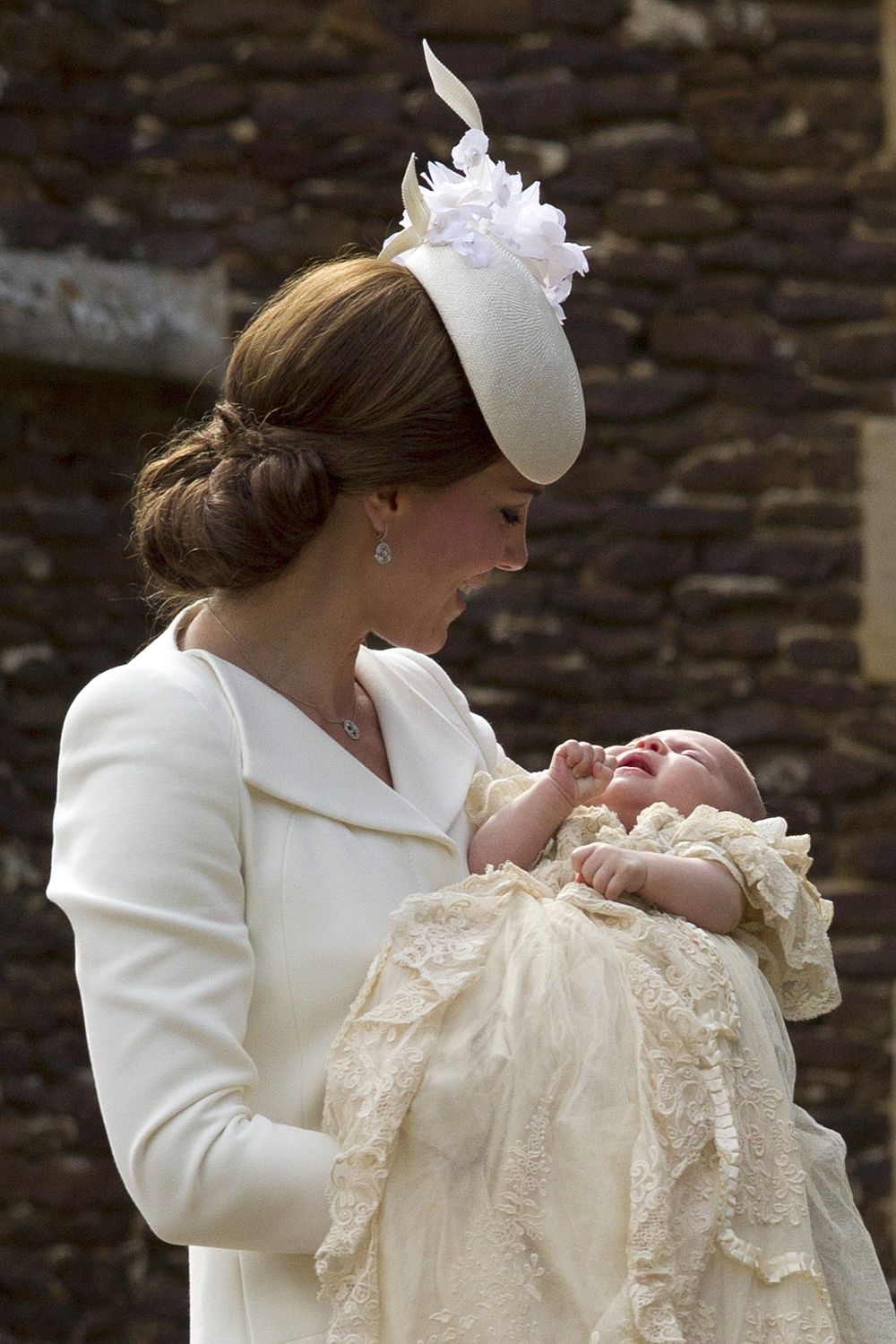 Kate carries Princess Charlotte