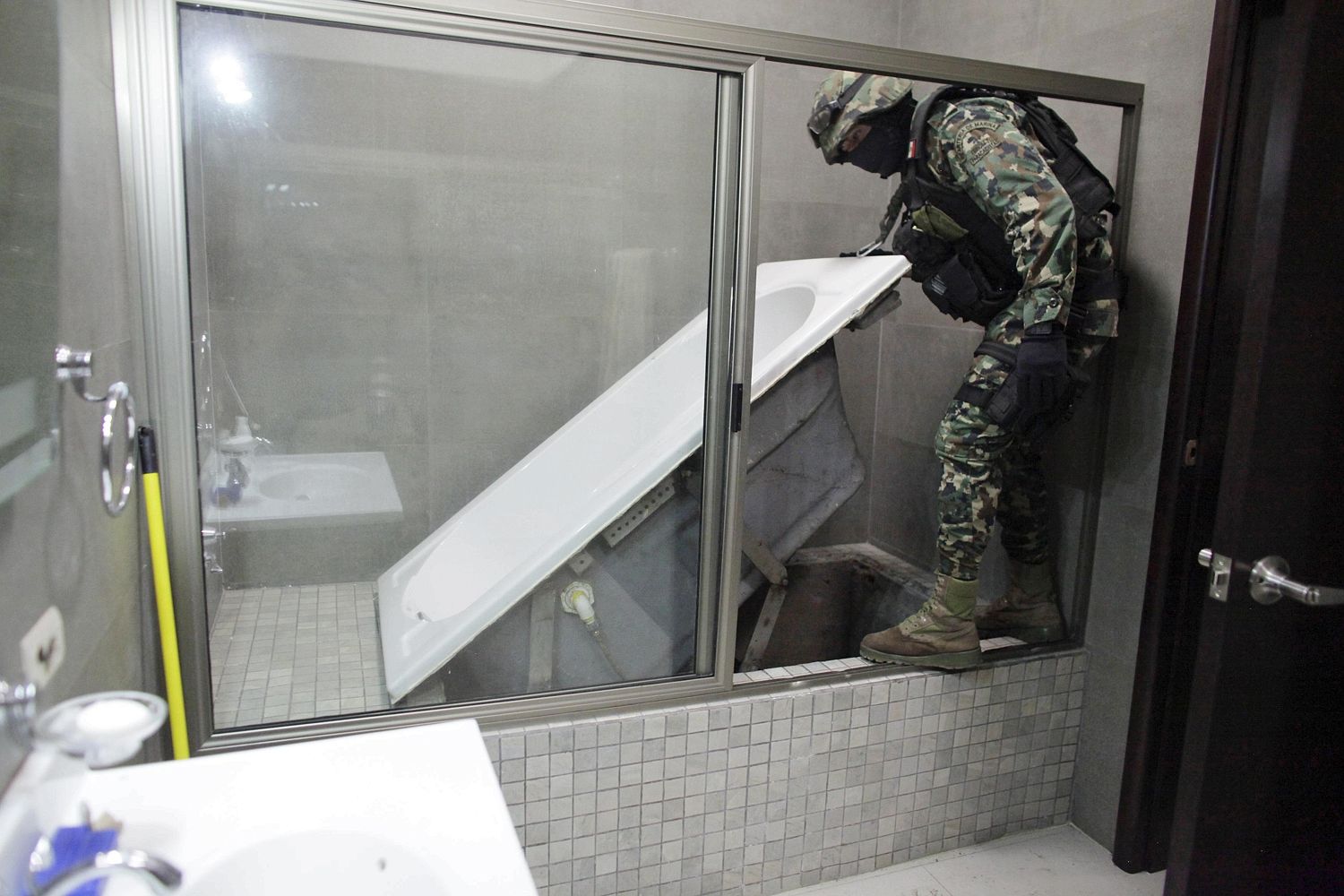 El Chapo's bath is lifted up to reveal secret underground tunnel