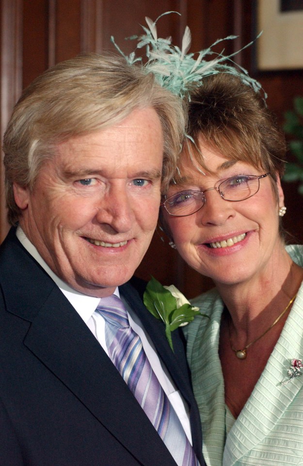  William, as Ken, and Anne Kirkbride as his wife Deirdre