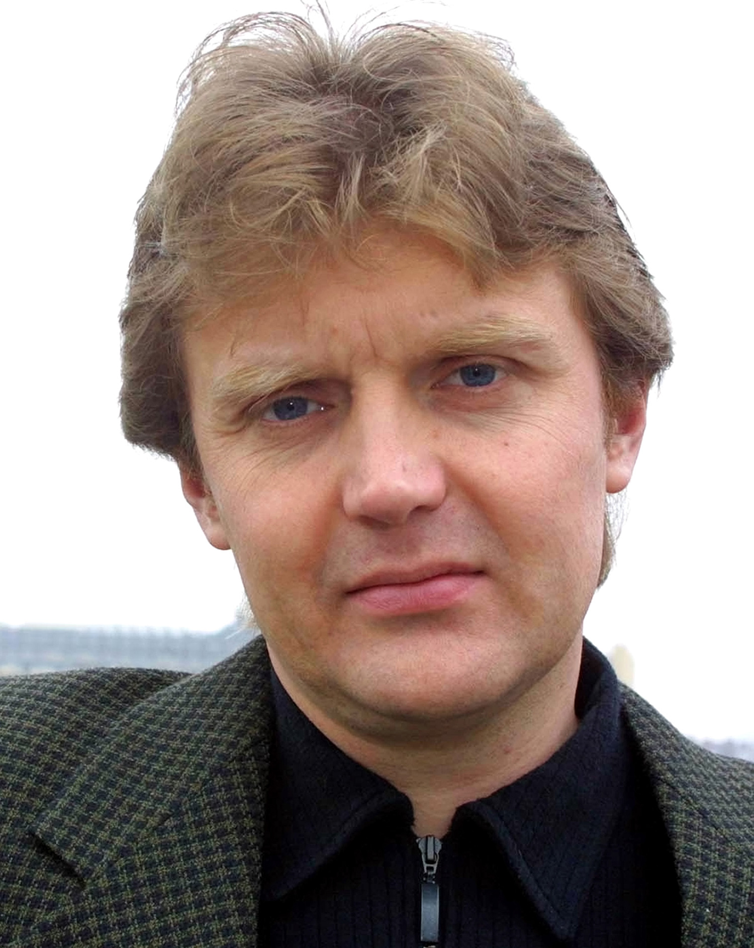 In this Friday, May 10, 2002 file photo Alexander Litvinenko, former KGB spy is photographed at his home in London.