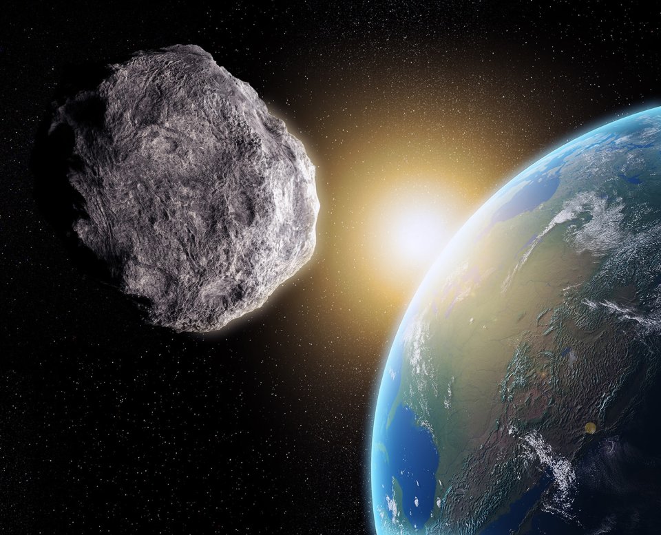  An artist's impression of an asteroid zooming past Earth