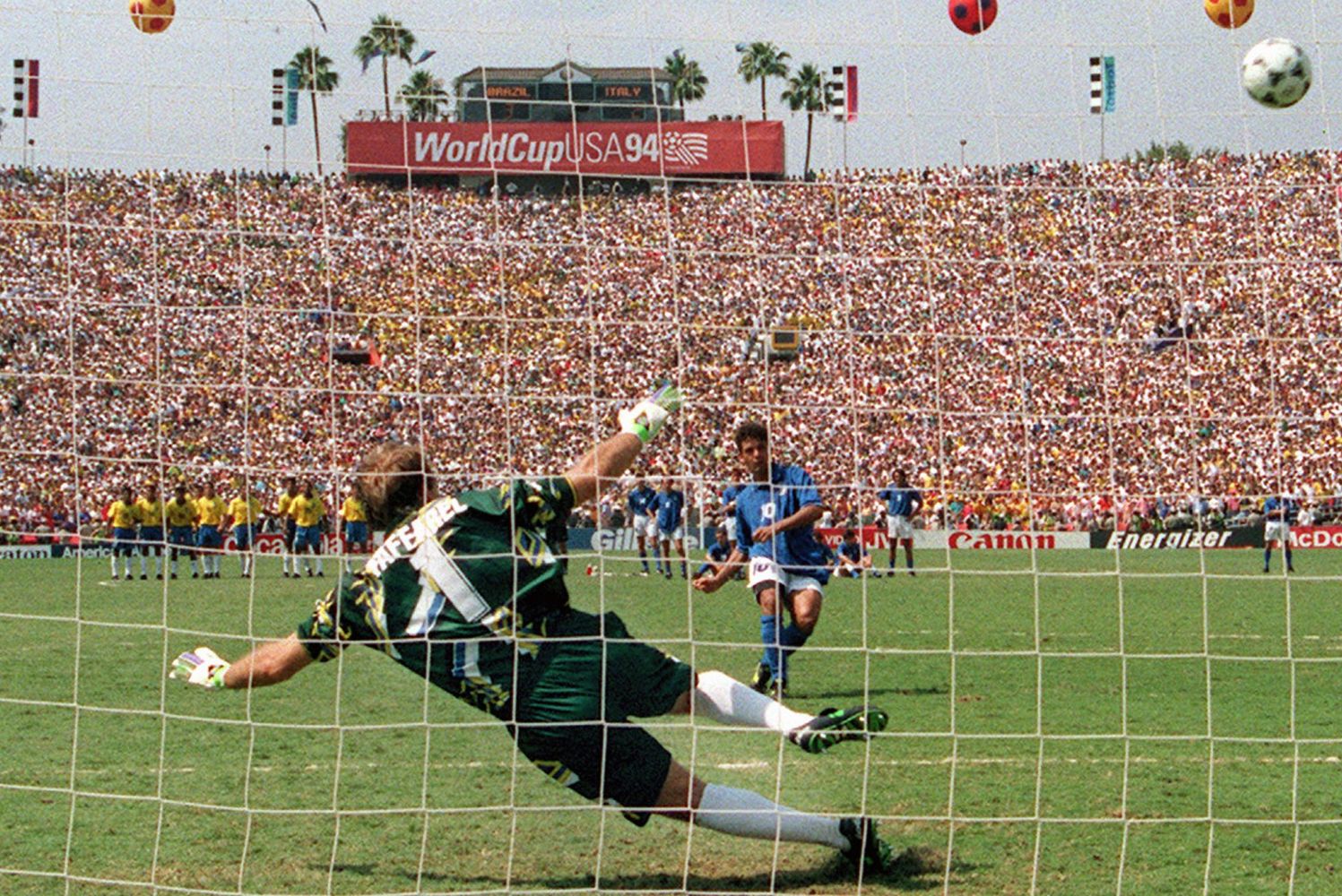 Roberto Baggio watches is on as his penalty in the 1994 World Cup final flies over the bar