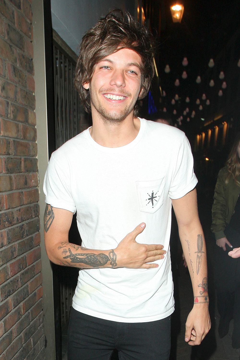 Tipped for top spot . . . new dad Louis Tomlinson could join Cowell on The X Factor judging panel