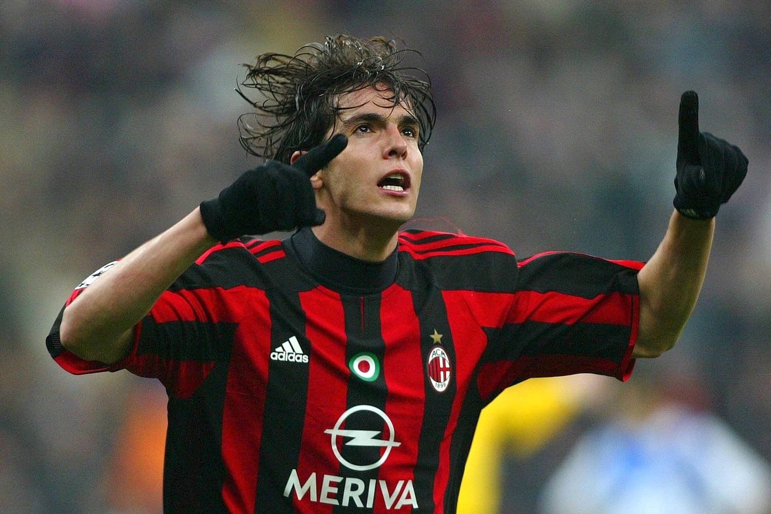 Kaka celebrates his goal in Milan's 4-1 win over Deportivo at the San Siro