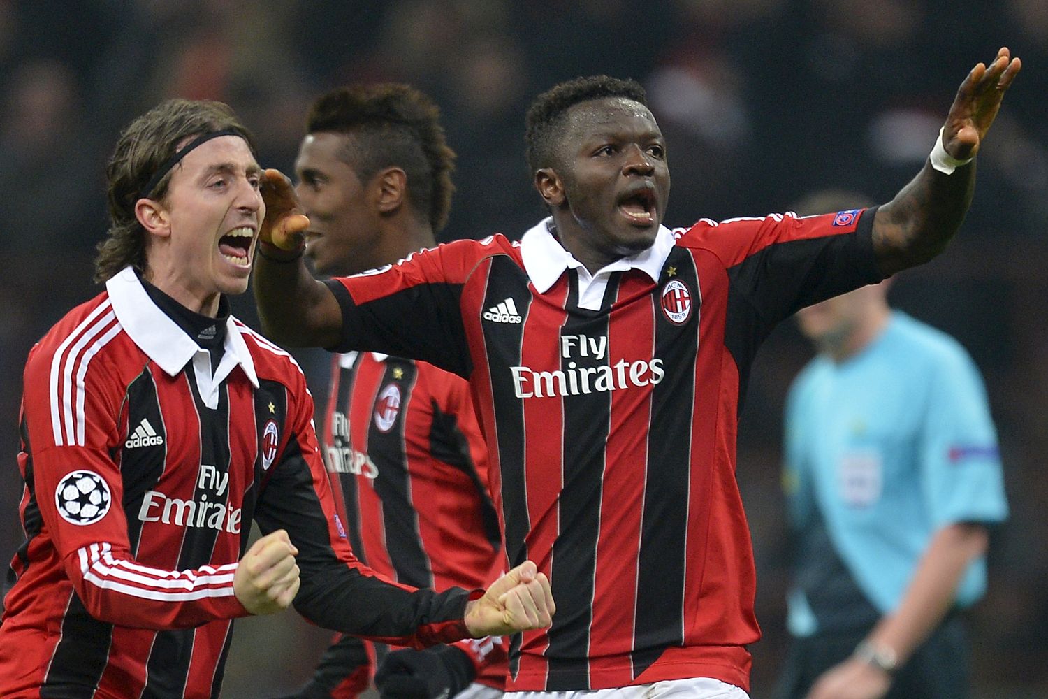 Sulley Muntari celebrates putting Milan 2-0 ahead against Barcelona