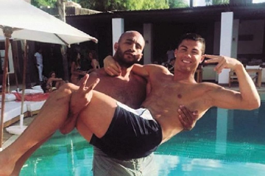  Cristiano Ronaldo in the arms of friend Badr Hari