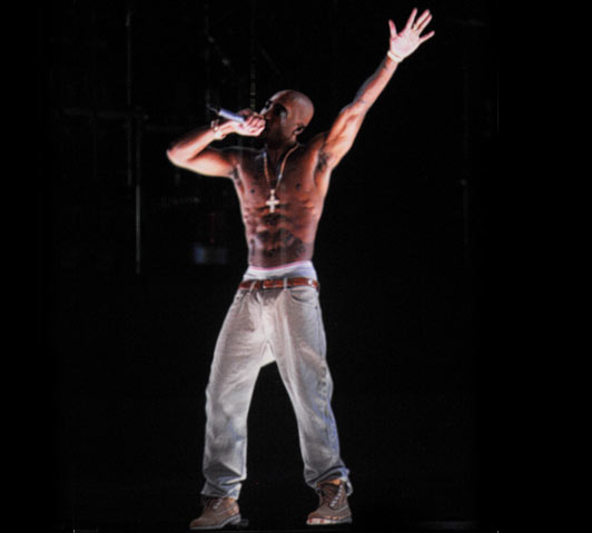 A holographic image of Tupac Shakur is seen performing during day 3 of the 2012 Coachella Valley Music & Arts Festival at the Empire Polo Field on April 15, 2012 in Indio, California