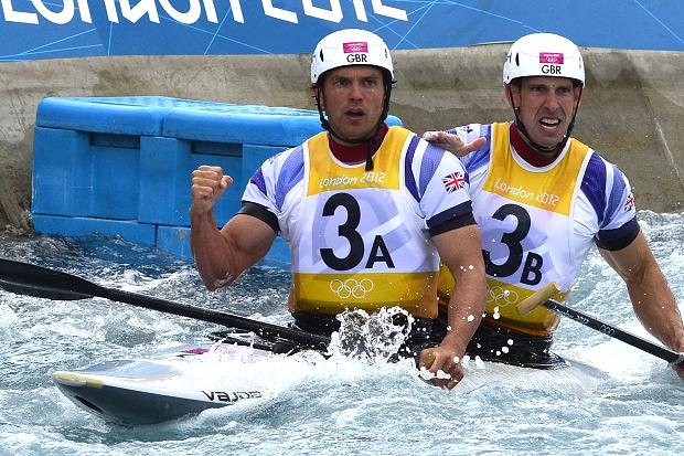 GOLDEN MOMENTS ... Britain's Tim Baillie and Etienne Stott react