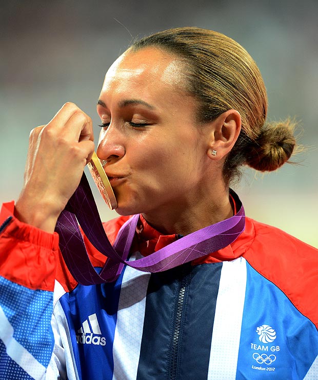 Great Britain's Jessica Ennis kisses her Gold Medal