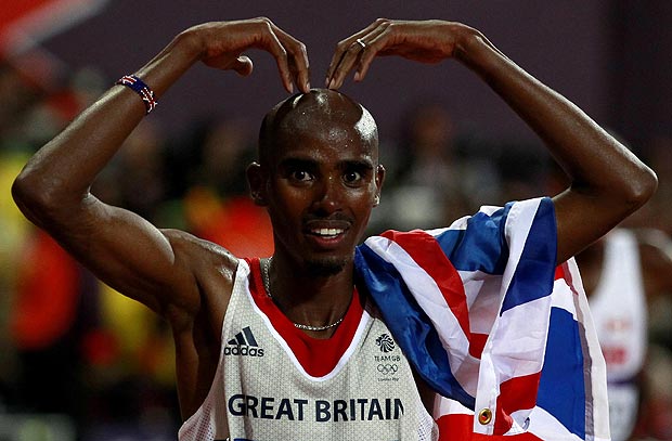 Great Britain's Mo Farah celebrates after winning the Men's 10,000m Final