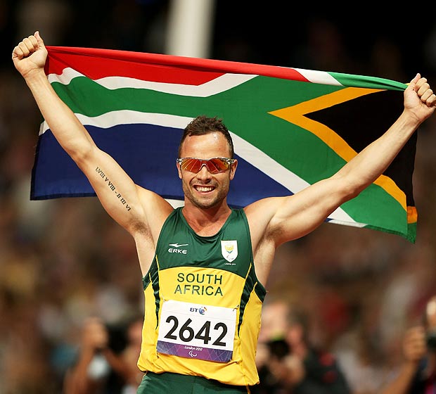 Oscar Pistorius of South Africa celebrates as he wins gold in the Men's 400m T44 Final