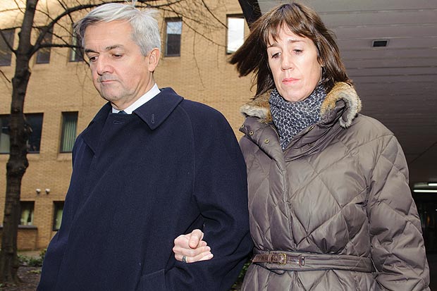 Former Energy Secretary Chris Huhne and his partner Carina Trimingham leave Southwark Crown Court, in central London, after Mr Huhne pleaded guilty to perverting the course of justice.