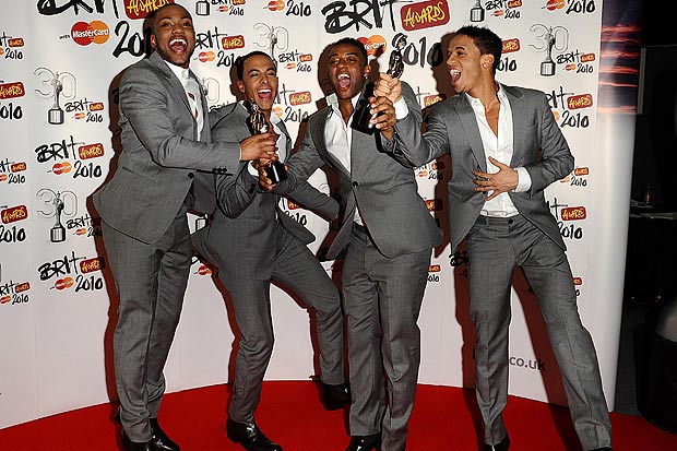 JLS (from left) JB, Marvin Humes, Ortise Williams and Aston Merrygold with the award for British Single and Breakthrough Act at the BRIT