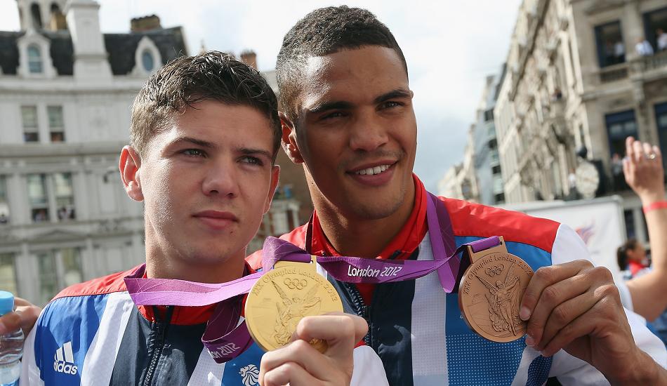  Luke Campbell poses with his Olympic gold medal and GB team-mate Anthony Ogogo