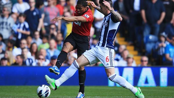 Jonas Olsson turns in Antonio Valencia's cross for 2-0 United