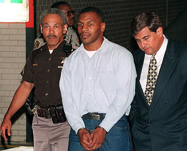 Picture dated 13 June 1994 shows heavyweight boxing champion Mike Tyson arriving at the Indianopolis court. Tyson, who spent three years in jail for rape and remains on probation, has been named in a sex battery complaint filed in Chicago, police said 09 April. The complaint was filed over the weekend by an unidentified woman and is being investigated. Tyson has not been charged.