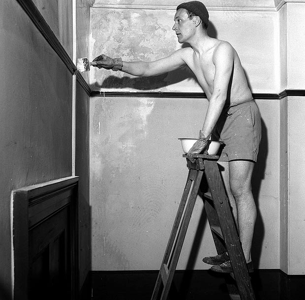 Tony Benn decorating the Labour Party offices at St. George, Bristol. The veteran politician died at home today at the age of 88, h