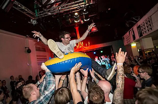 Stephen Sutton crowd surfing at Slam Dunk Festival at Wolverhampton Civic Hall while Cancer Bats were playing 27 May 2013. Stephen Sutton (19) has been battling cancer since the age of 15, Burntwood, Lichfield.