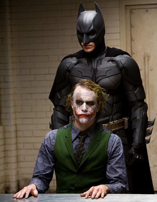 CHRISTIAN BALE as Batman and HEATH LEDGER