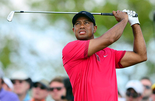 Tiger Woods tees off from the 4th hole during the final round of the WGC