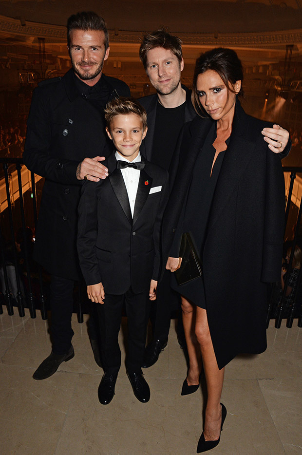 LONDON, ENGLAND - NOVEMBER 03: (L to R) David Beckham, Romeo Beckham, Christopher Bailey, Chief Creative and Chief Executive Officer of Burberry, and Victoria Beckham attend the launch of the Burberry festive campaign at 121 Regent Street on November 3, 2014 in London, England. (Photo by David M. Benett/Getty Images for Burberry)