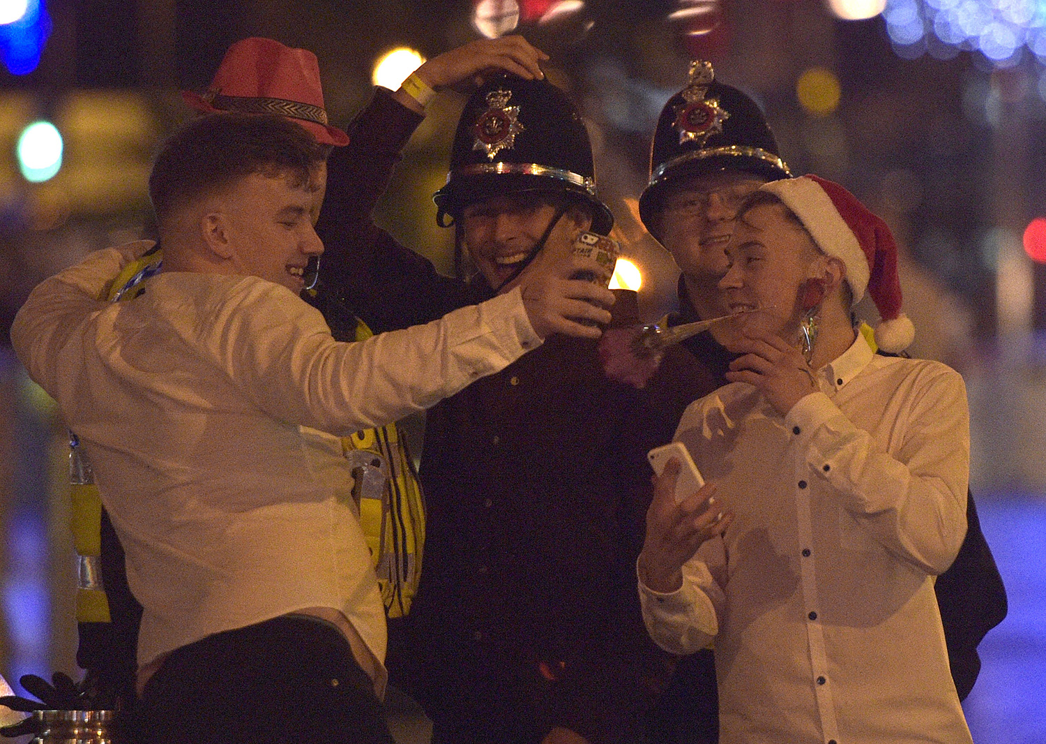 vellers in St Mary Street, Cardiff during Black Eye Friday, as people across the country celebrate the start of the Christmas break by hitting bars, pubs and clubs.