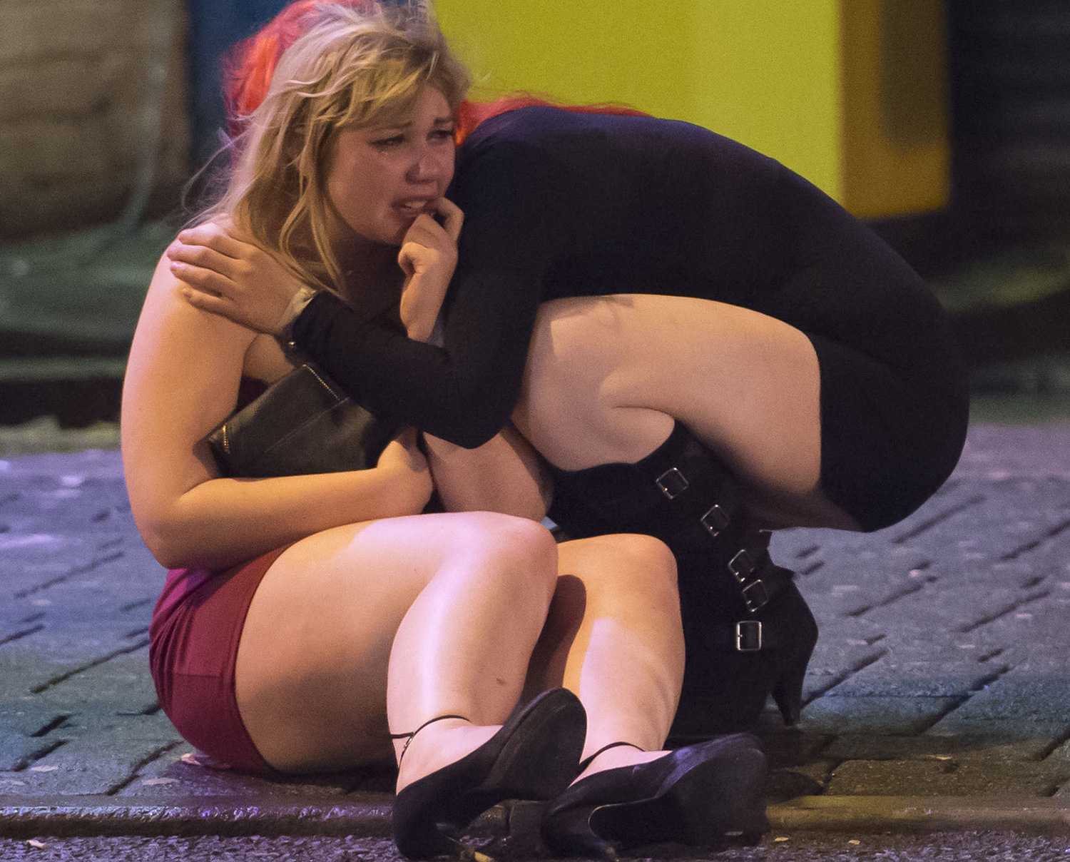 evellers out in Cardiff City centre, South Wales, on Black Friday. Black Friday, also known as Mad Friday, is traditionally one of the busiest nights of the year for pubs and clubs. Picture shows two women on Greyfriars Road