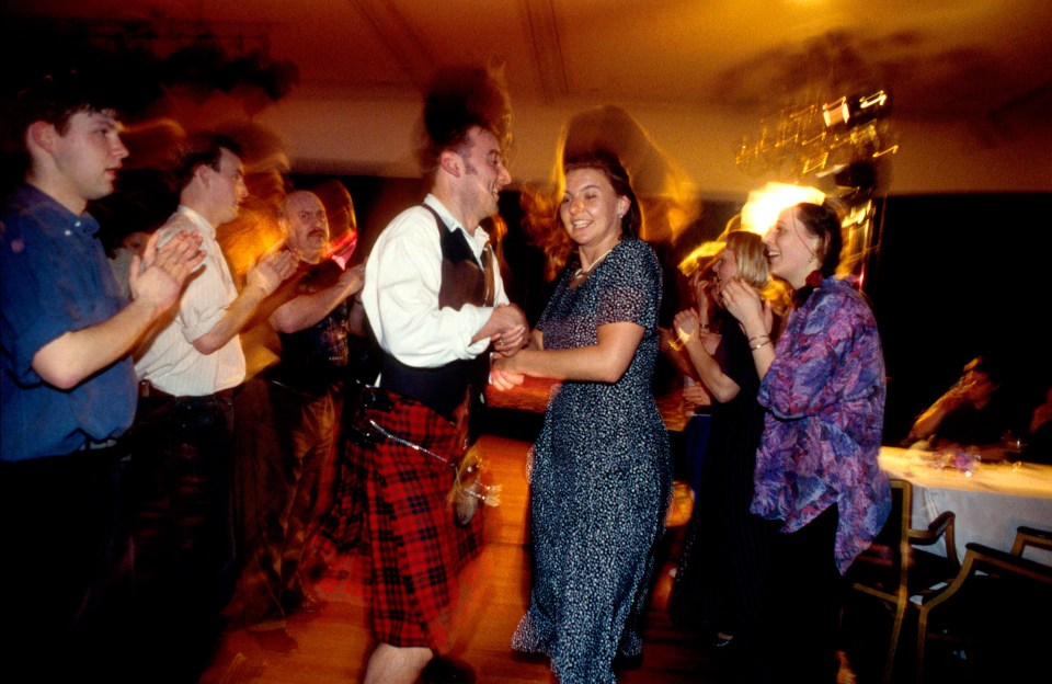 A group ceilidh dancing on St Andrew's Day