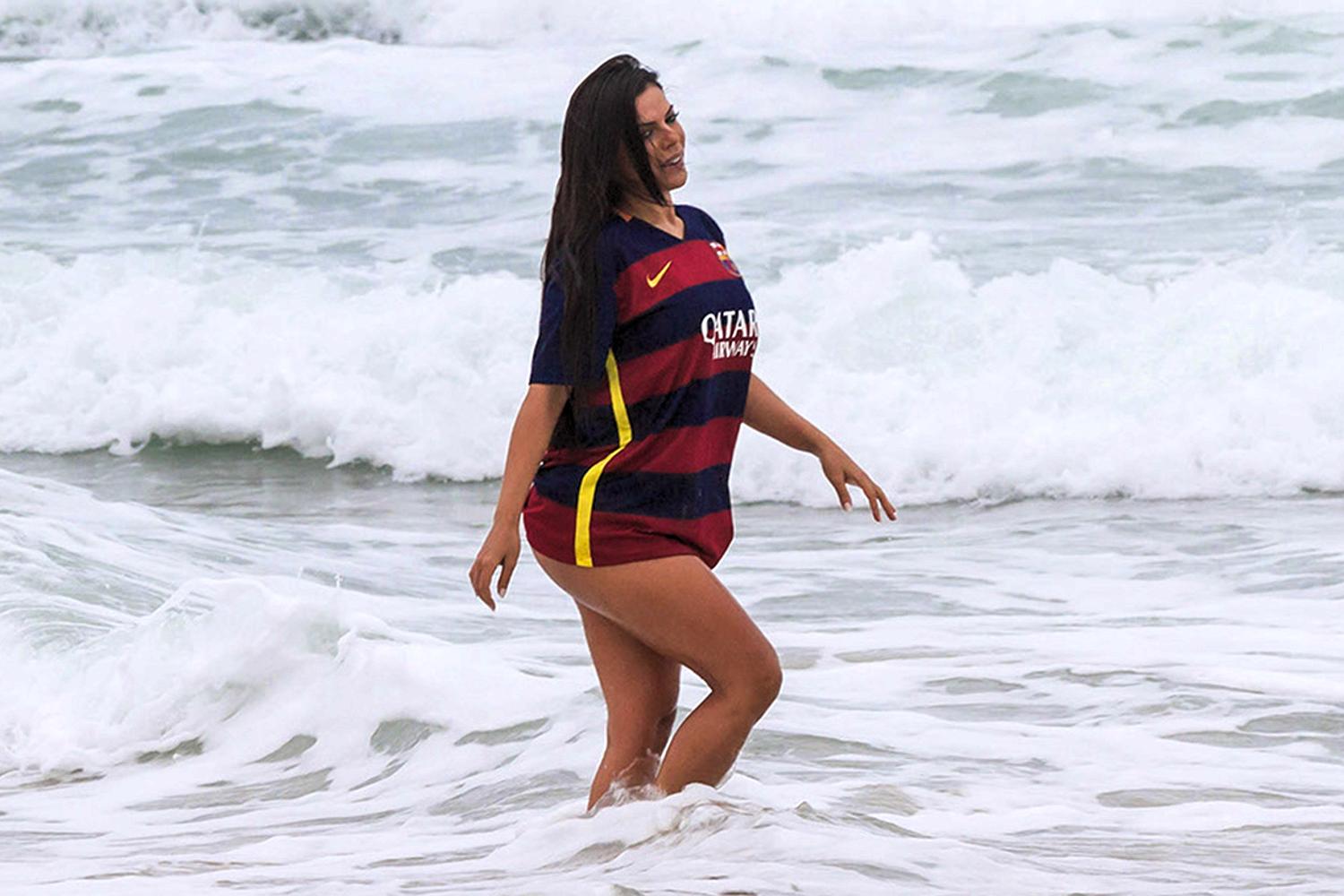 Miss BumBum Brazil takes a dip in the sea to cool off