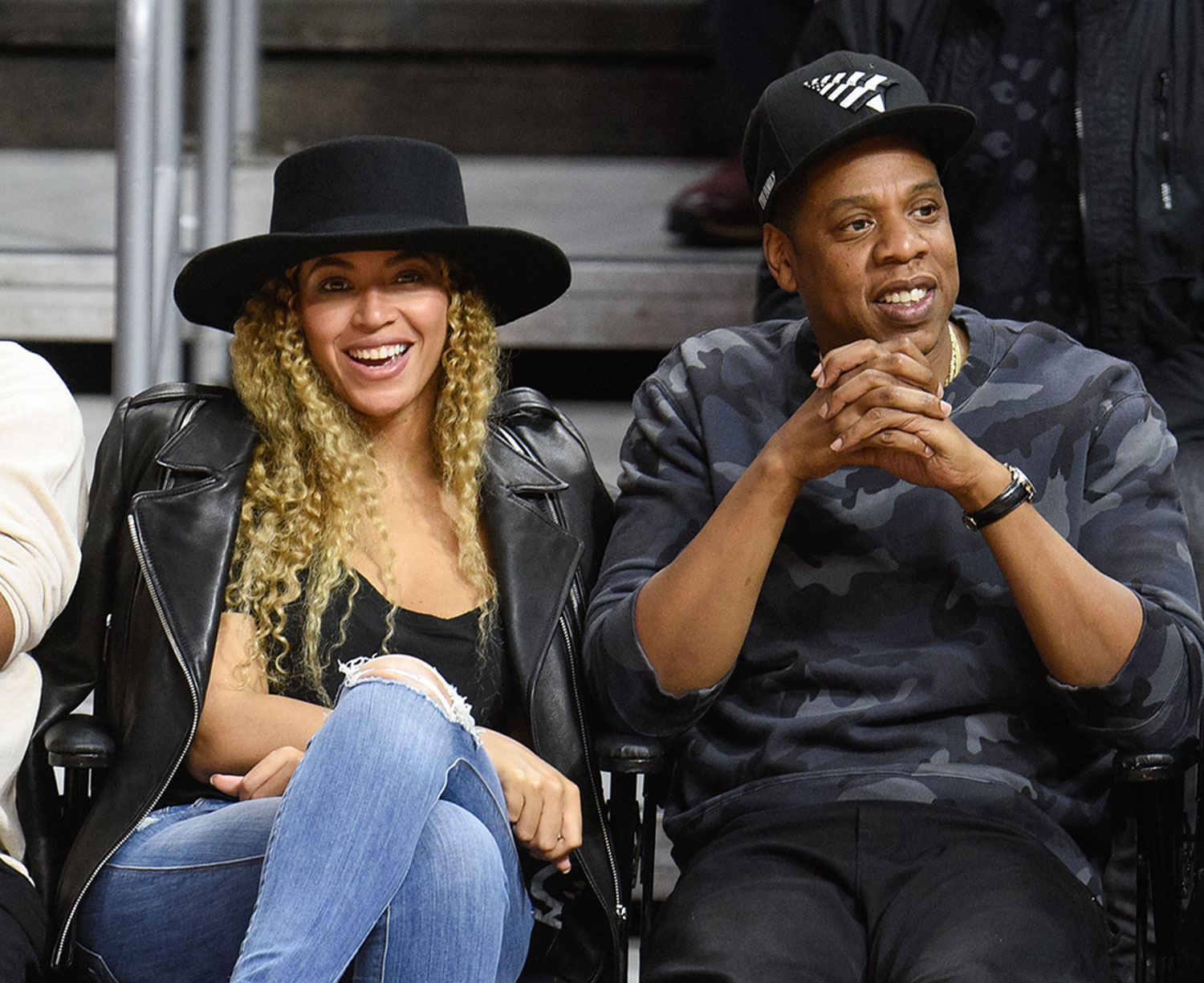 Beyonce (L) and Jay-Z attend a basketball game between the Oklahoma City Thunder and the Los Angeles Clippers at Staples Center on March 2, 2016 in Los Angeles, California.