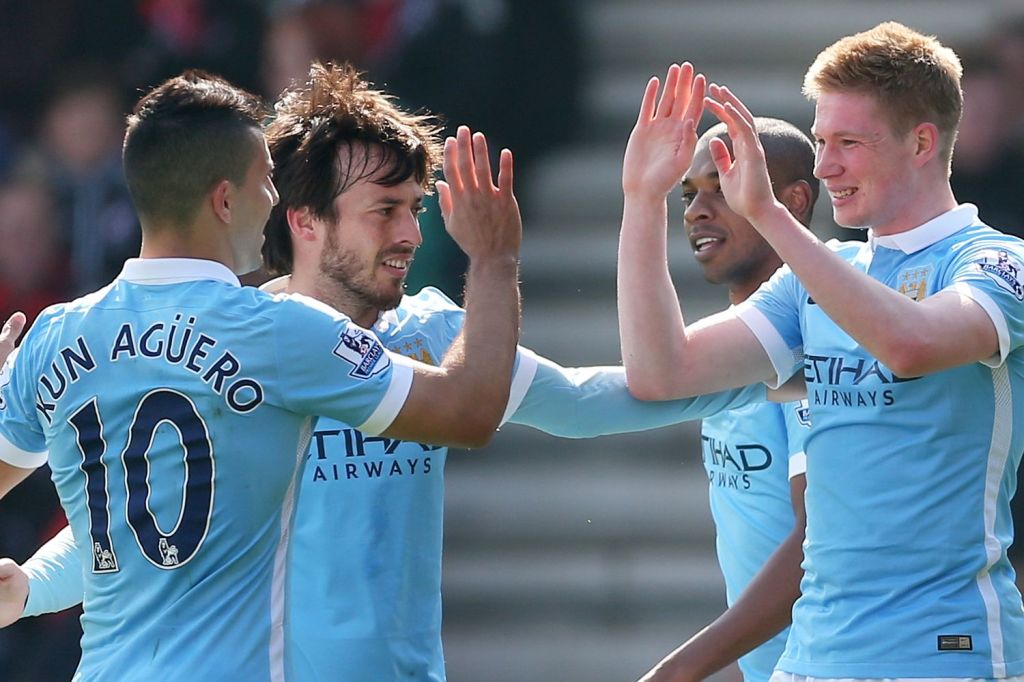  Belgian playmaker celebrates 12th-minute strike with Sergio Aguero and David Silva