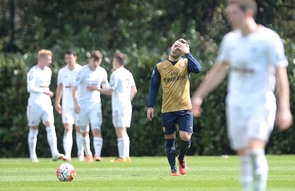  Jack Wilshere reacts as Swansea score against Arsenal Under-21s