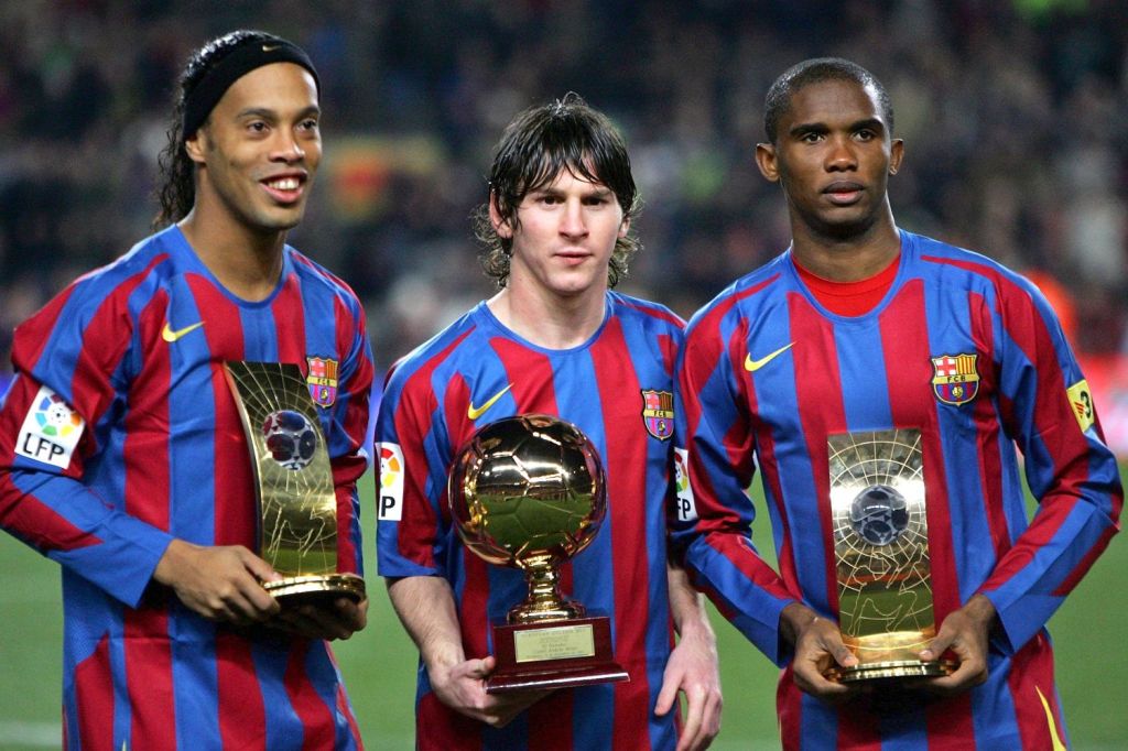  Ronaldinho, Samuel Eto'o and the up-and-coming Lionel Messi show off their personal accolades