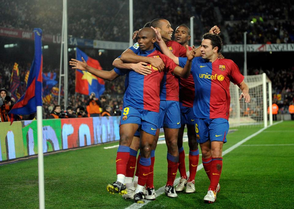  Barcelona players celebrate after Samuel Eto'o opened scoring in Champions League final