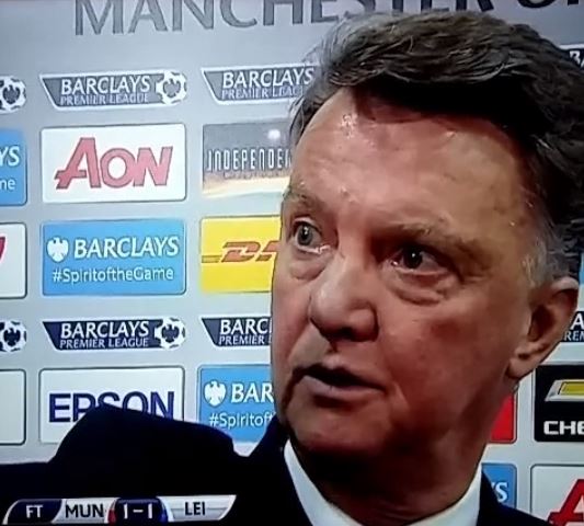 Louis van Gaal grabs a Sky Sports reporter's hair in demonstration