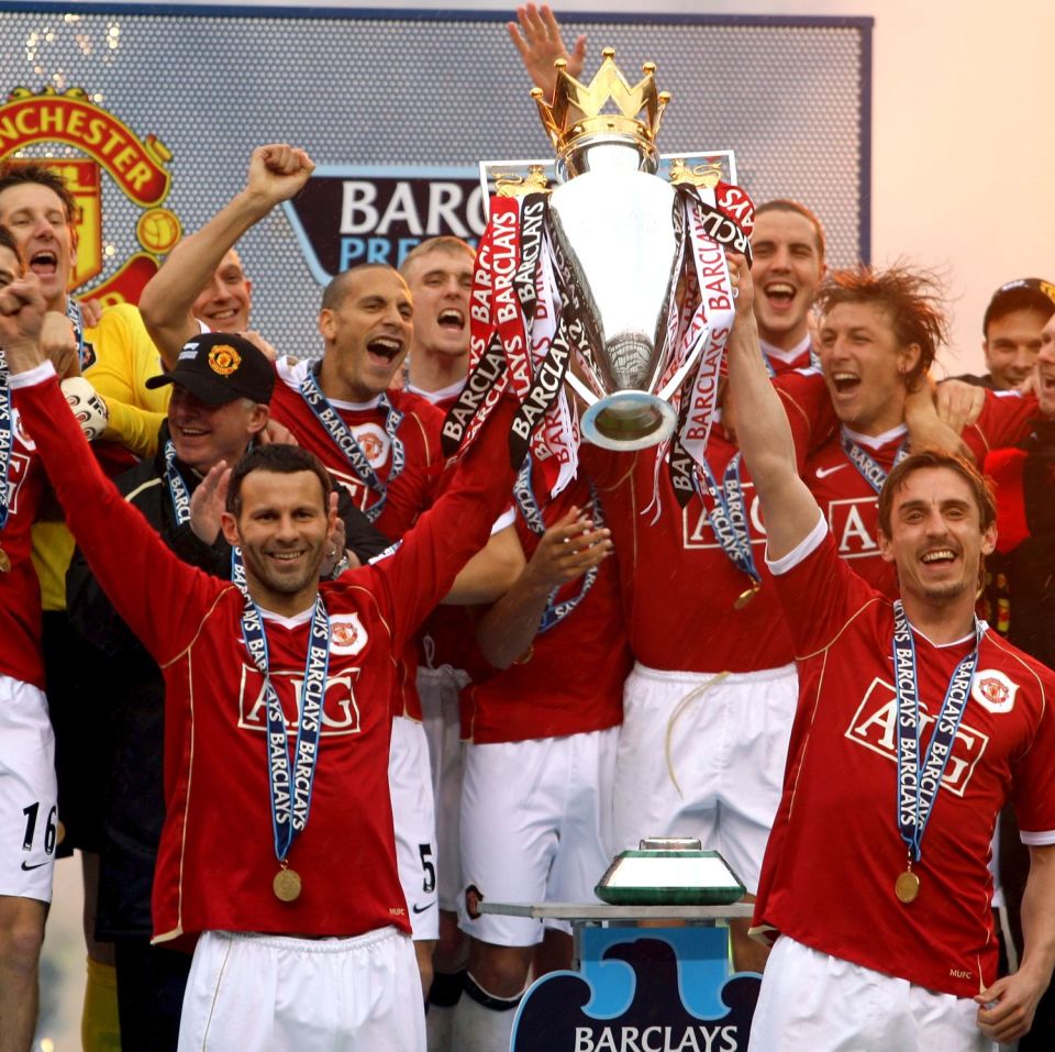  Skipper Gary Nevill and vice-captain, Ryan Giggs, lift the Premier League trophy in 2007