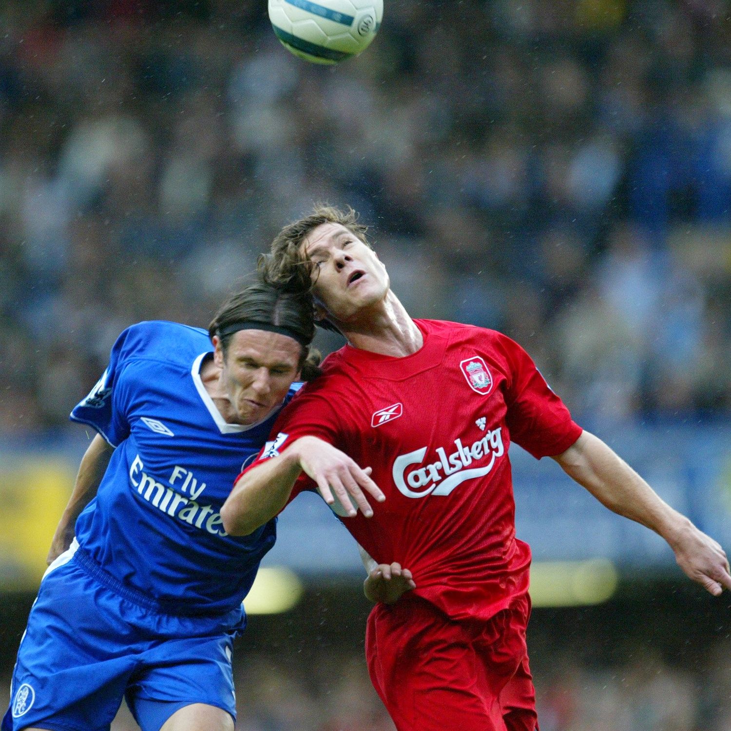 Premier League stalwarts Alexey Smertin and Xabi Alonso engage in a Titanic battle