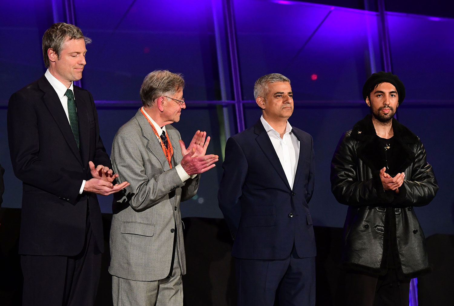 Newly elected London Mayor Sadiq Khan (2nd R) is congratulated by other candidates including Conservative Pary candidate Zac Goldsmith (L) following his election victory at City Hall in central London on May 7, 2016.