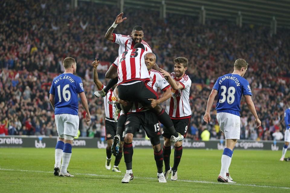 Sunderland player celebrate Lamine Kone's goal to put them three-up against Everton 