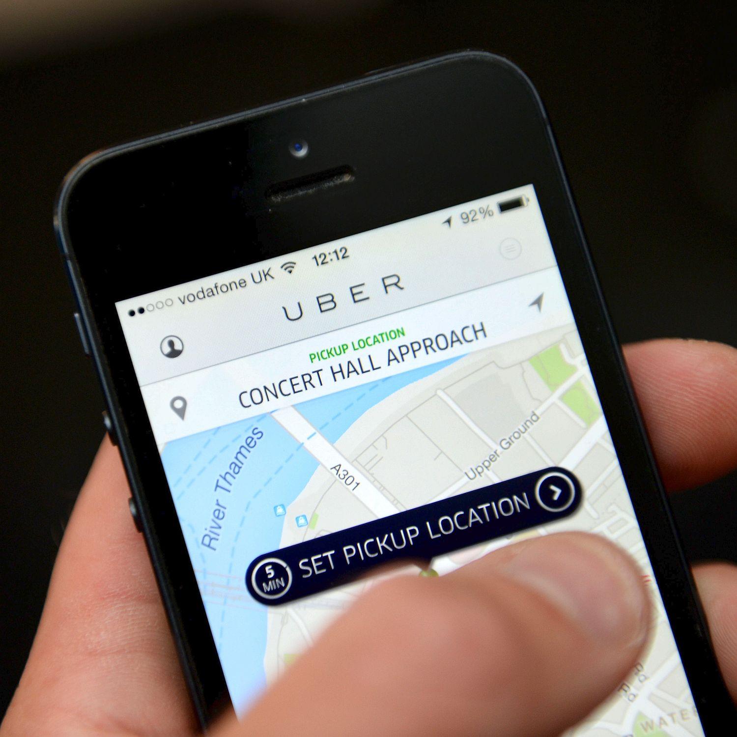 Rapid growth ... Uber offers cheaper fares than black cabs but is under growing pressure