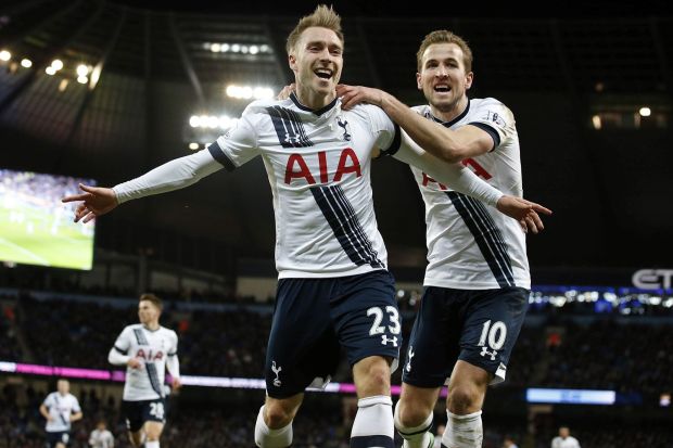 Happy days as Eriksen celebrates a goal with Harry Kane